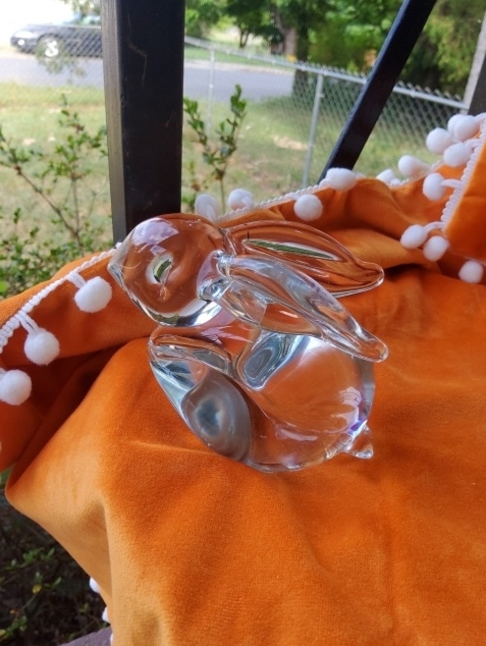 Clear glass rabbit paperweight.